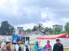 Plt. Kadinkes Lampung Selatan, Lakukan Pemantauan Fasyankes Dan Berikan Bantuan Korban Banjir Desa BandarAgung.