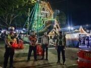 Polres Lampung Tengah Terjunkan Puluhan Personel,Untuk Amankan Event Titik Kumpul di Tugu Kopiah Emas.