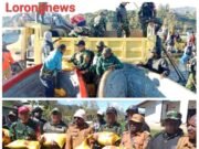 Dansatgas Yonif 4 Marinir Dampingi Bupati Paniai Berikan Sembako Kepada Masyarakat Terkena Banjir