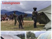 Satgas Yonif 700/WYC Pos Gome Bantu Warga Dirikan Tenda Ibadah di Halaman Gereja Gome