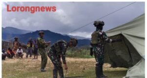 Satgas Yonif 700/WYC Pos Gome Bantu Warga Dirikan Tenda Ibadah di Halaman Gereja Gome