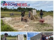 Satgas Pamtas Kewilayahan RI-PNG Yonif 410/Alugoro Bersama Warga Membangun Fasilitas Sekolah