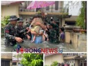 Prajurit Yonkav 6/NK Bantu Warga Terjebak Banjir di Asam Kumbang