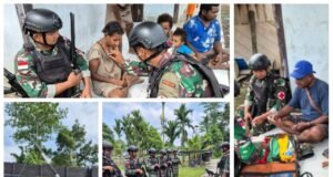 Satgas Pamtas Kewilayahan RI-PNG Yonif 410/Alg Berikan Yankes di Kampung Naikere